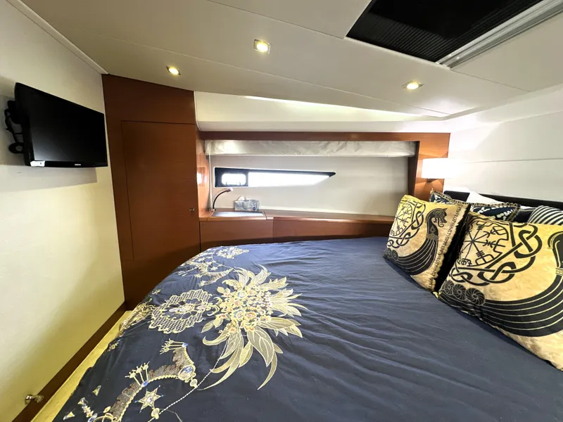 Slide: The Image of Luxurious bedroom interior of 2013 Prestige 500 yacht with elegant bedding and modern decor. - 34