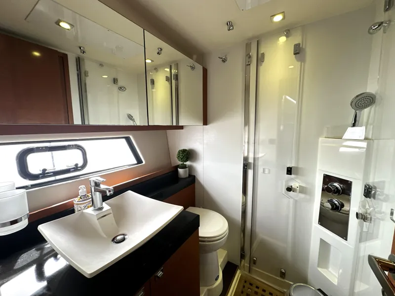 Slide: The Image of Luxurious bathroom in 2013 Prestige 500 yacht with modern fixtures and elegant design. - 36