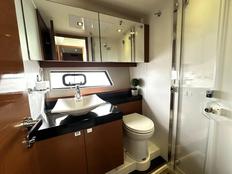 Slide: The Image of Luxurious bathroom in 2013 Prestige 500 yacht with modern fixtures and elegant design. - 37