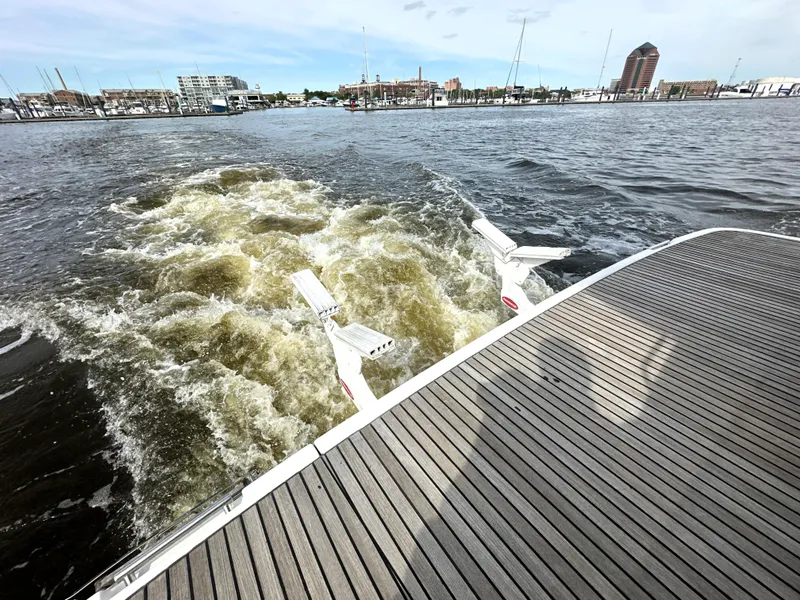 Slide: The Image of Prestige 500 yacht cruising, creating wake in harbor, 2013 model. - 5