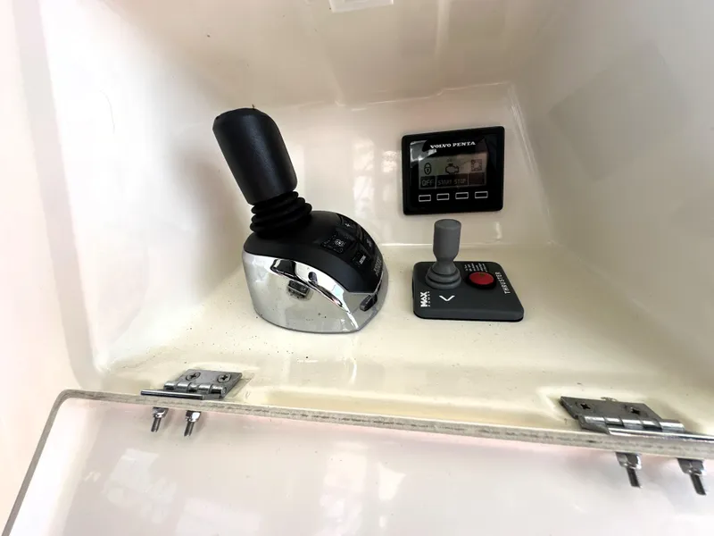 Slide: The Image of Control panel of a 2013 Prestige 500 yacht with joystick and display. - 8