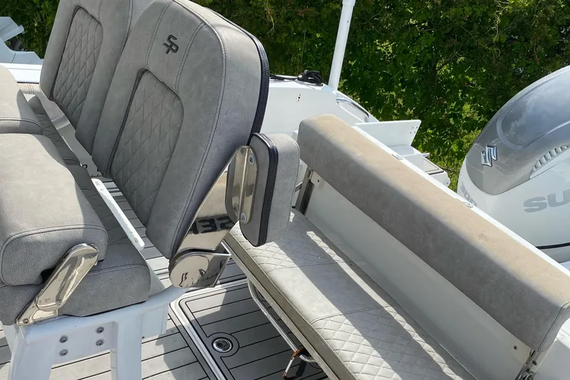 Slide: The Image of 2021 Sea Pro 239 Center Console boat seating and deck detail. - 4