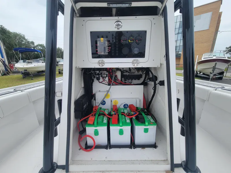 Slide: The Image of 2024 Blazer Bay 2440 boat electrical panel with batteries and wiring. - 33