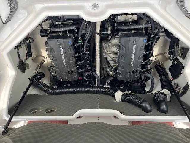 Slide: The Image of 2021 Yamaha Boats 212XE engine compartment with dual high-output engines. - 10