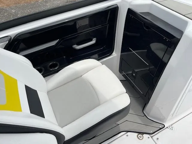 Slide: The Image of 2021 Yamaha Boats 212XE interior with sleek seating and modern design. - 9