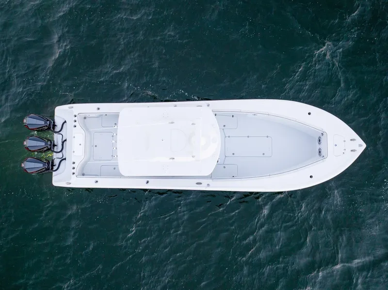 Slide: The Image of Aerial view of 2023 Yellowfin 34 boat on open water. - 11