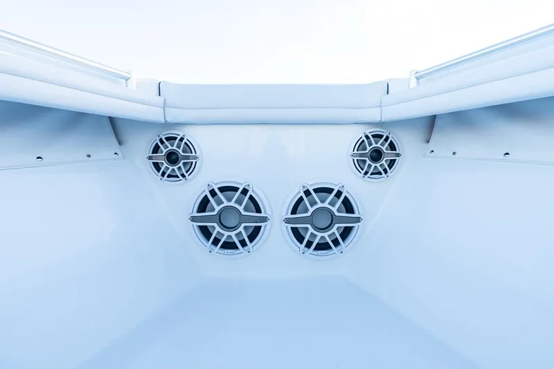 Slide: The Image of 2023 Yellowfin 34 boat speakers in a sleek, white interior setup. - 30