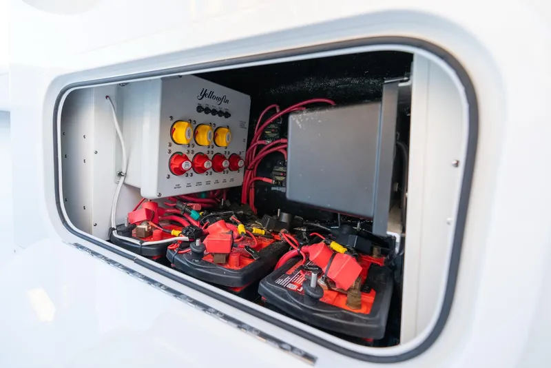 Slide: The Image of 2023 Yellowfin 34 boat electrical system with batteries and wiring. - 32