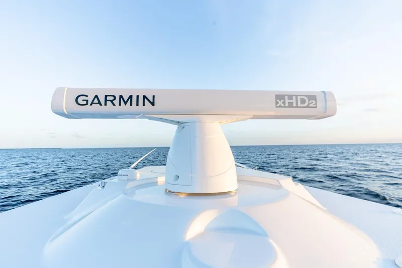 Slide: The Image of 2023 Yellowfin 34 boat with Garmin xHD2 radar on open sea. - 33