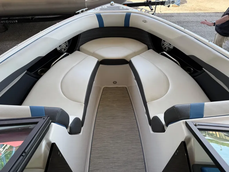 Slide: The Image of 2017 Regal 2300 RX Surf boat interior with cushioned seating and modern design. - 12