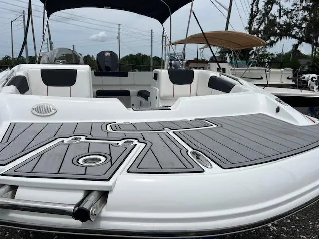 Slide: The Image of 2023 Tahoe 1950 boat with sleek deck design and comfortable seating. - 10