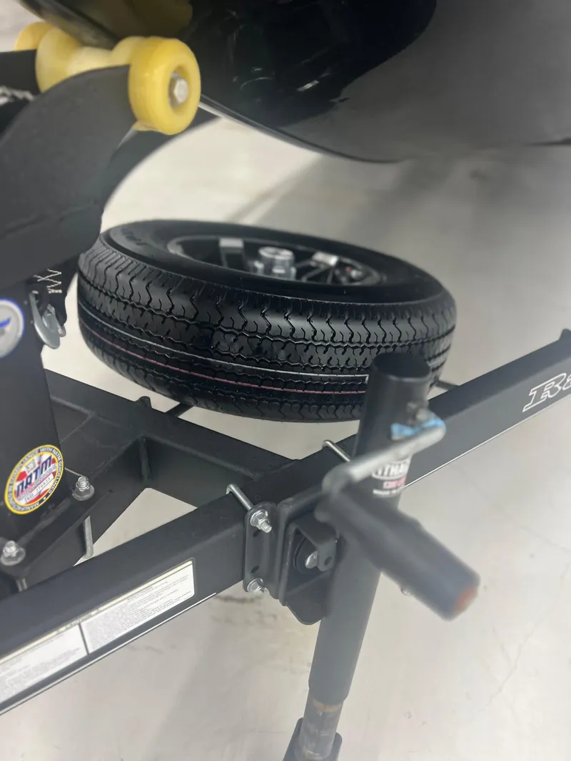 Slide: The Image of 2024 Ranger RT188P trailer with spare tire and hitch detail. - 10