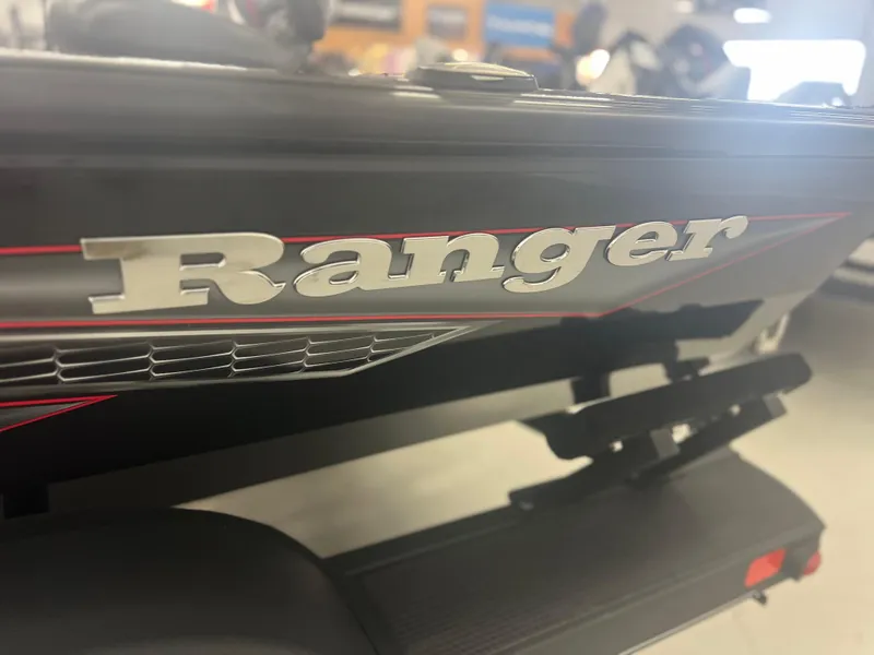 Slide: The Image of 2024 Ranger RT188P boat with logo and sleek design details. - 12