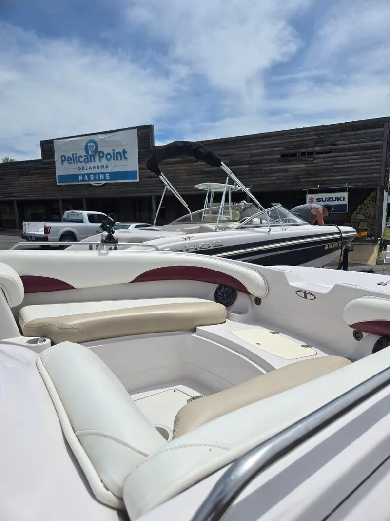 Slide: The Image of 2008 Tahoe 215 I/O boat at Pelican Point Marina, sunny day, outdoor display. - 7