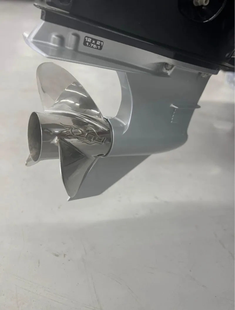 Slide: The Image of 2021 Vexus 2080 boat propeller, shiny metal finish, close-up view. - 14