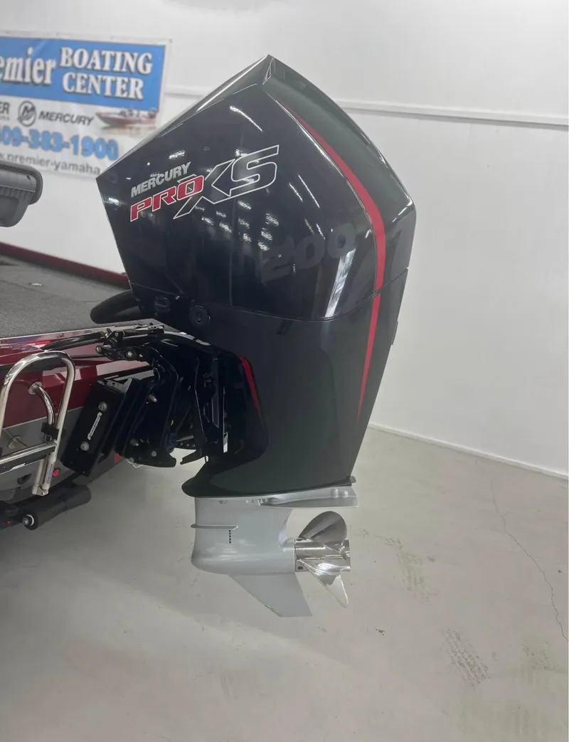 Slide: The Image of 2021 Vexus 2080 boat with Mercury Pro XS outboard motor in showroom. - 16