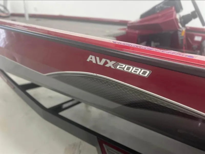 Slide: The Image of 2021 Vexus AVX 2080 boat, red and gray exterior, close-up view. - 9