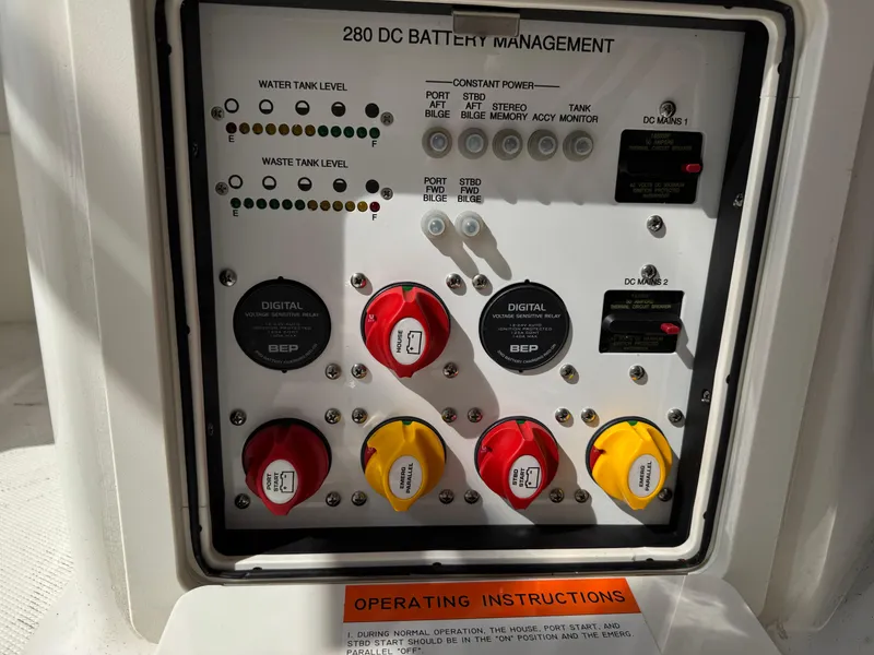 Slide: The Image of Control panel of 2020 World Cat 280 DC-X boat, featuring battery management and operating instructions. - 18