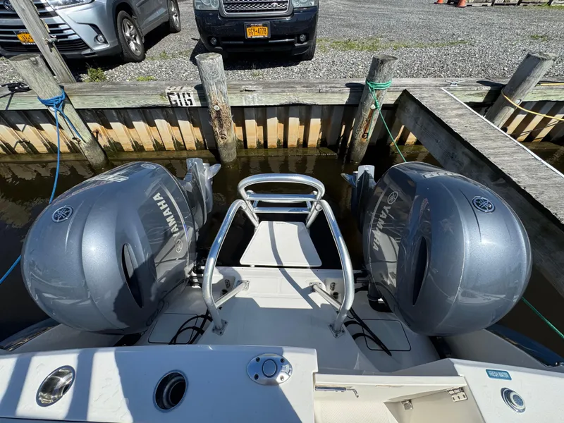 Slide: The Image of World Cat 280 DC-X 2020 boat with dual Yamaha outboard engines docked at marina. - 24