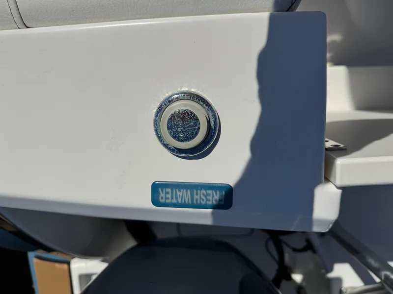 Slide: The Image of Fresh water button on 2020 World Cat 280 DC-X boat. - 28