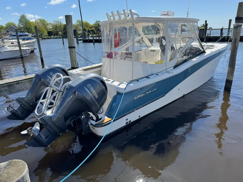 Slide: The Image of 2020 World Cat 280 DC-X boat docked with dual Yamaha outboard engines. - 3