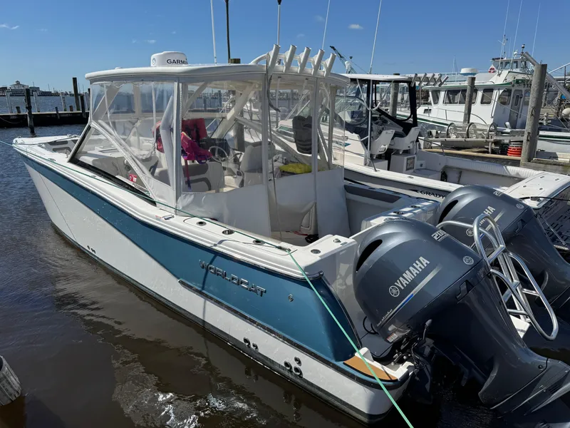 Slide: The Image of 2020 World Cat 280 DC-X boat with Yamaha engines docked at marina. - 5