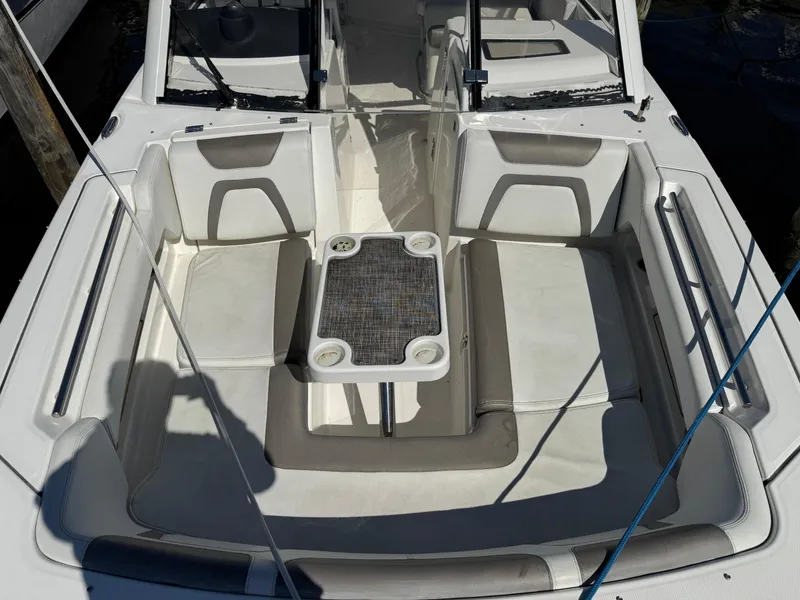 Slide: The Image of 2020 World Cat 280 DC-X boat interior with seating and table. - 6