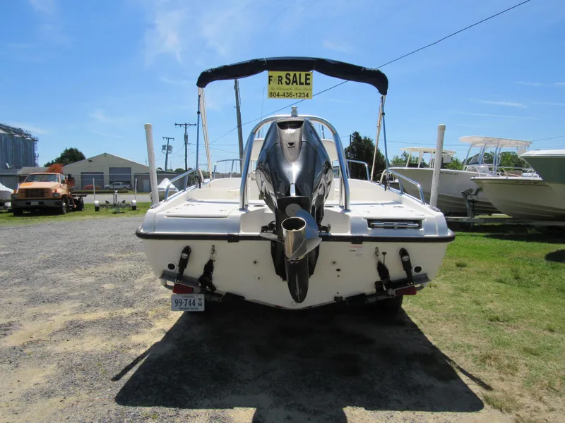 Slide: The Image of 2013 Boston Whaler 200 Dauntless boat for sale, rear view with outboard motor. - 4