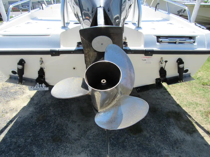 Slide: The Image of 2013 Boston Whaler 200 Dauntless boat propeller, rear view, on a sunny day. - 8