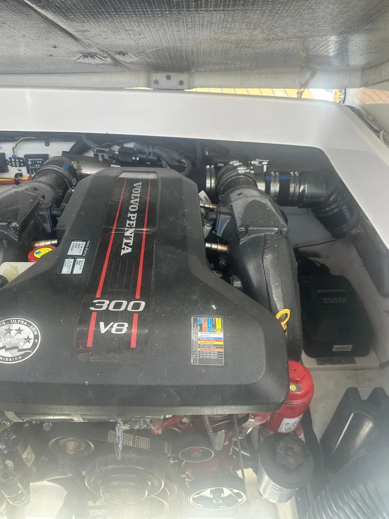 Slide: The Image of 2014 Chaparral 307 SSX engine compartment featuring Volvo Penta 300 V8 engine. - 42