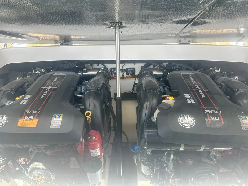 Slide: The Image of Twin V8 engines in a 2014 Chaparral 307 SSX boat engine compartment. - 44