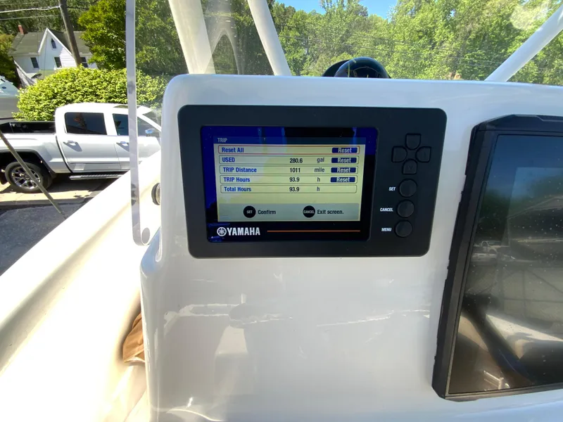 Slide: The Image of Yamaha display on 2019 Cobia 220 Center Console boat dashboard, showing trip data. - 29