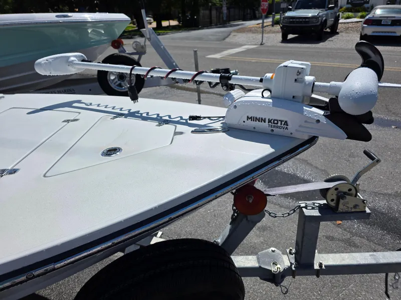 Slide: The Image of 2024 Hewes Redfisher 18 boat with Minn Kota Terrova trolling motor on trailer. - 4