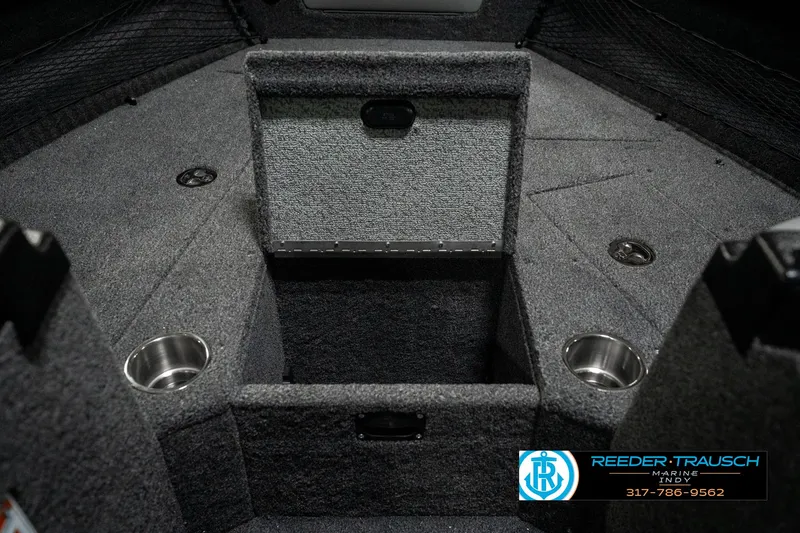 Slide: The Image of Interior of 2025 Lund 1975 Tyee boat with storage compartments and cup holders. - 25