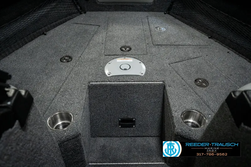 Slide: The Image of Interior of 2025 Lund 1975 Tyee boat with carpeted deck and cup holders. - 26