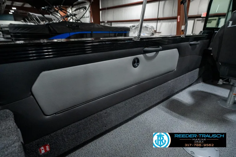 Slide: The Image of Interior view of a 2025 Lund 1975 Tyee boat, featuring sleek design and modern finishes. - 33