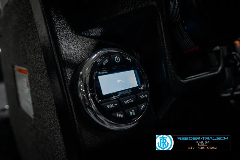 Slide: The Image of Control panel of 2025 Lund 1975 Tyee boat with Kicker audio system. - 43