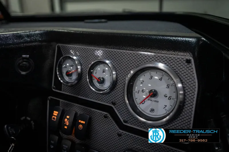Slide: The Image of Dashboard of 2025 Lund 1975 Tyee boat with gauges and controls. - 44