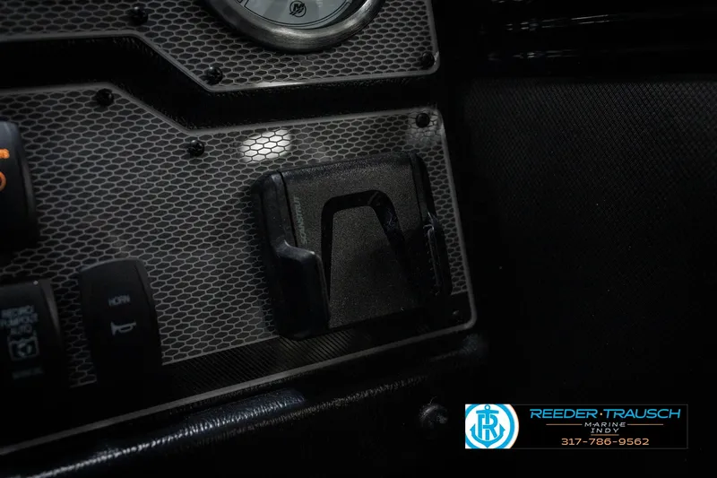 Slide: The Image of Dashboard of 2025 Lund 1975 Tyee boat with control panel and logo. - 47