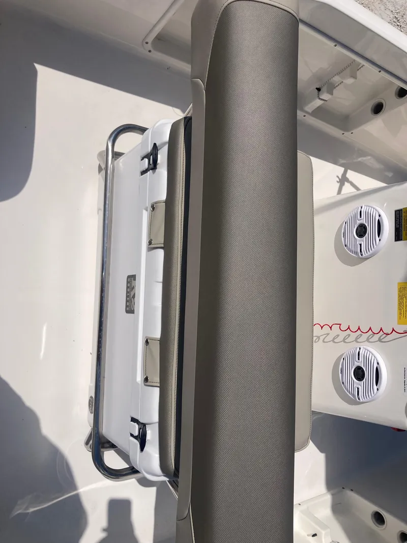 Slide: The Image of 2025 Key West 1720CC boat interior with seating and storage features. - 6