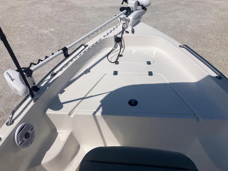 Slide: The Image of 2025 Key West 1720CC boat deck with mounted equipment and storage compartments. - 8