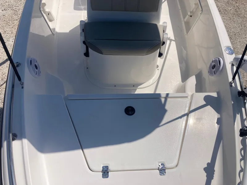 Slide: The Image of 2025 Key West 1720CC boat interior with seating and storage compartments. - 9