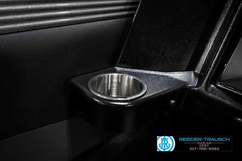 Slide: The Image of 2025 Lund 1875 Tyee boat interior with stainless steel cup holder. - 48