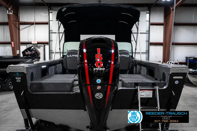 Slide: The Image of 2025 Lund 1875 Tyee boat with 150 HP engine in showroom. - 9
