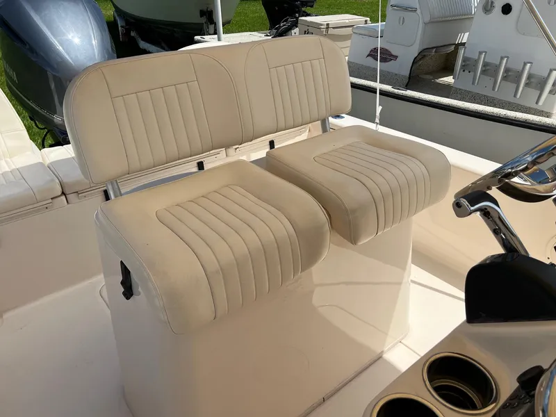 Slide: The Image of 2014 Grady-White 251 Coastal Explorer boat seats with beige upholstery. - 18