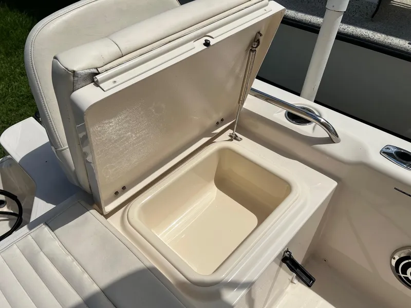 Slide: The Image of Open storage compartment on 2014 Grady-White 251 Coastal Explorer boat. - 31