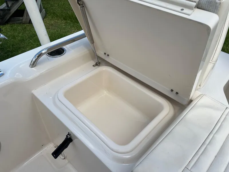 Slide: The Image of Open storage compartment on 2014 Grady-White 251 Coastal Explorer boat. - 32