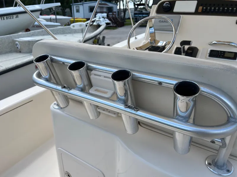 Slide: The Image of 2014 Grady-White 251 Coastal Explorer boat with rod holders and steering console. - 35
