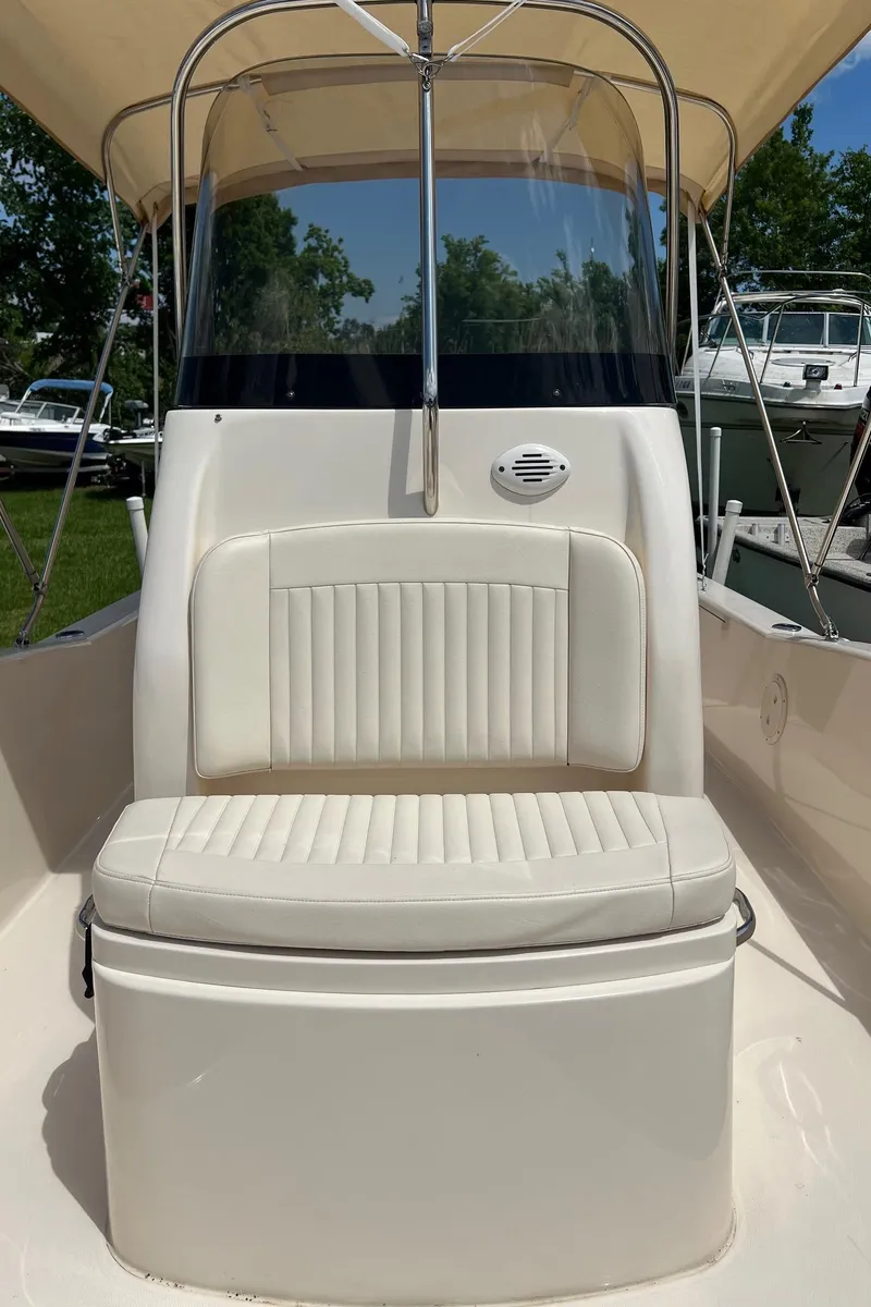 Slide: The Image of 2014 Grady-White 251 Coastal Explorer boat seat with canopy and windshield. - 40