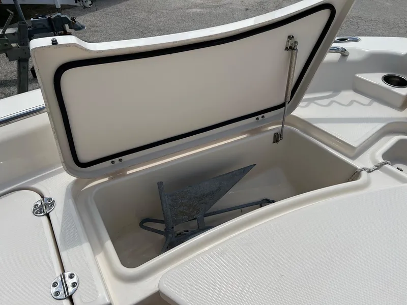 Slide: The Image of Open storage compartment on 2014 Grady-White 251 Coastal Explorer boat. - 8
